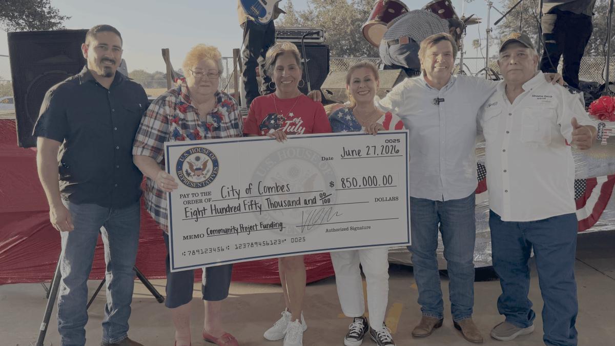 Congressman Gonzalez presents the City of Combes with a check for $850,000 during the 4th Annual Independence Day Party.