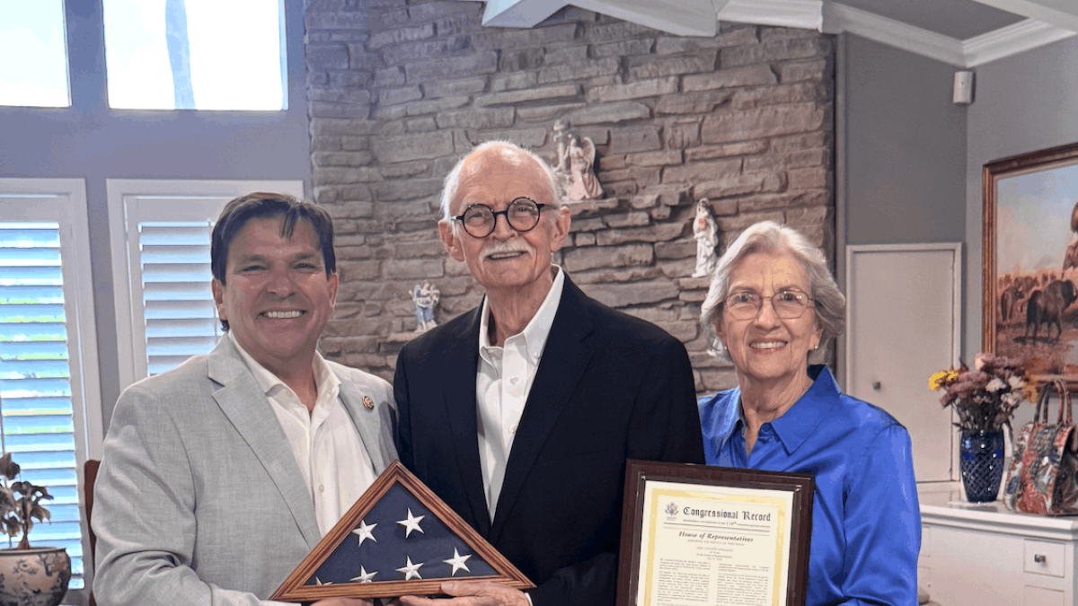 Congressman Gonzalez pictured with Former Commissioner John Wood and Mrs. Wood.