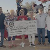 Congressman Gonzalez presents the City of Combes with a check for $850,000 during the 4th Annual Independence Day Party.