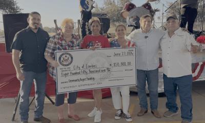 Congressman Gonzalez presents the City of Combes with a check for $850,000 during the 4th Annual Independence Day Party.